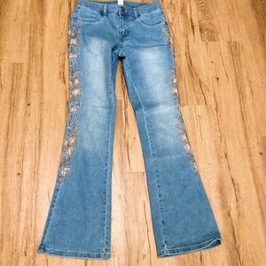 jeans with embroidered and rhinestone design